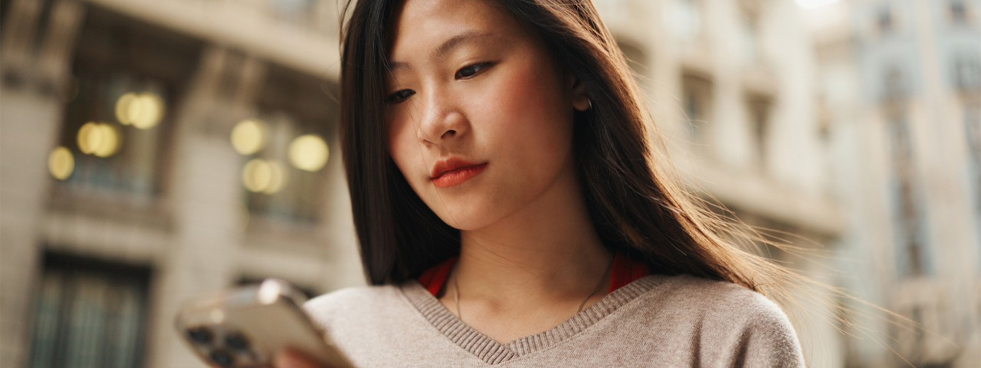 Portrait shot of a woman using her smartphone