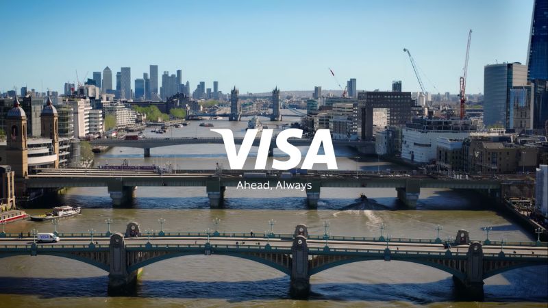 Cityscape with Visa logo and Ahead, Always superimposed on image.