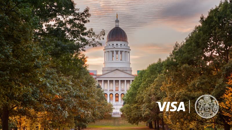 Maine capital building with visa maine logos