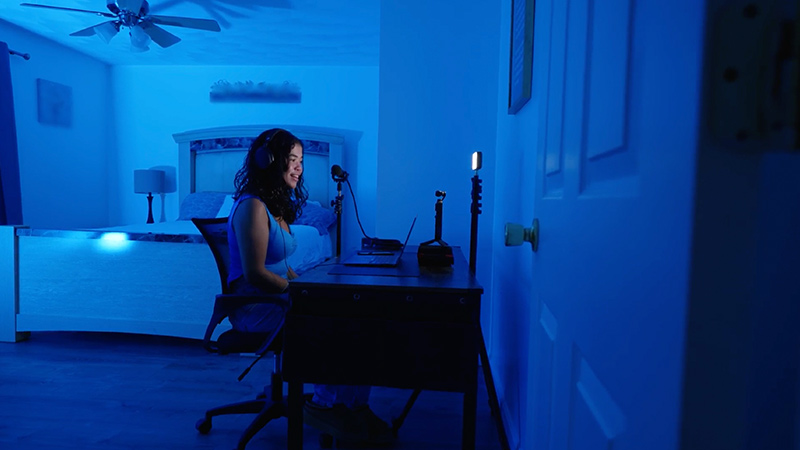 A student podcasting from her bedroom.